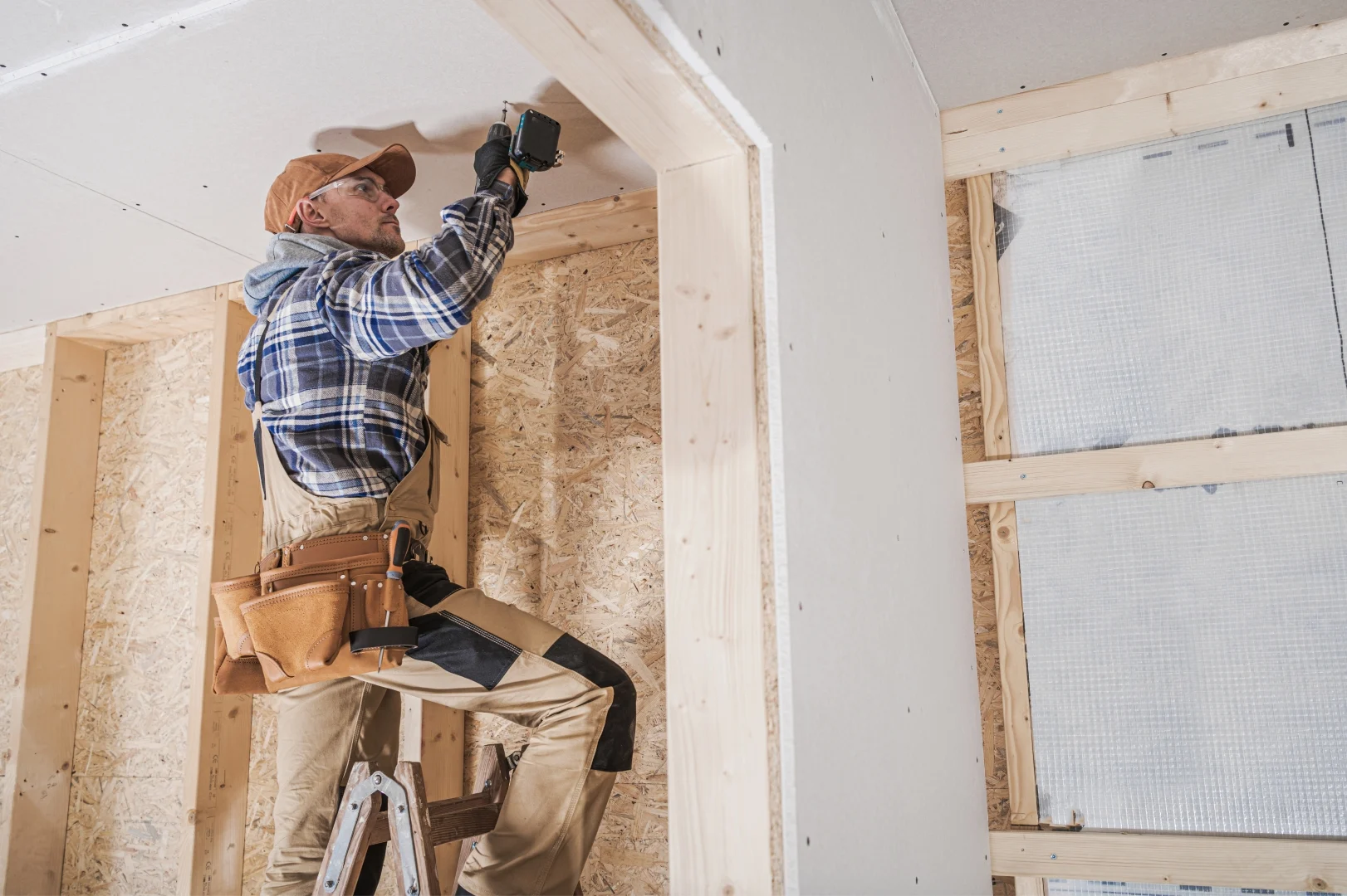 General Construction Contractor Worker Attaching Drywall